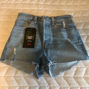 Levi’s button fly high rise distressed shorts
